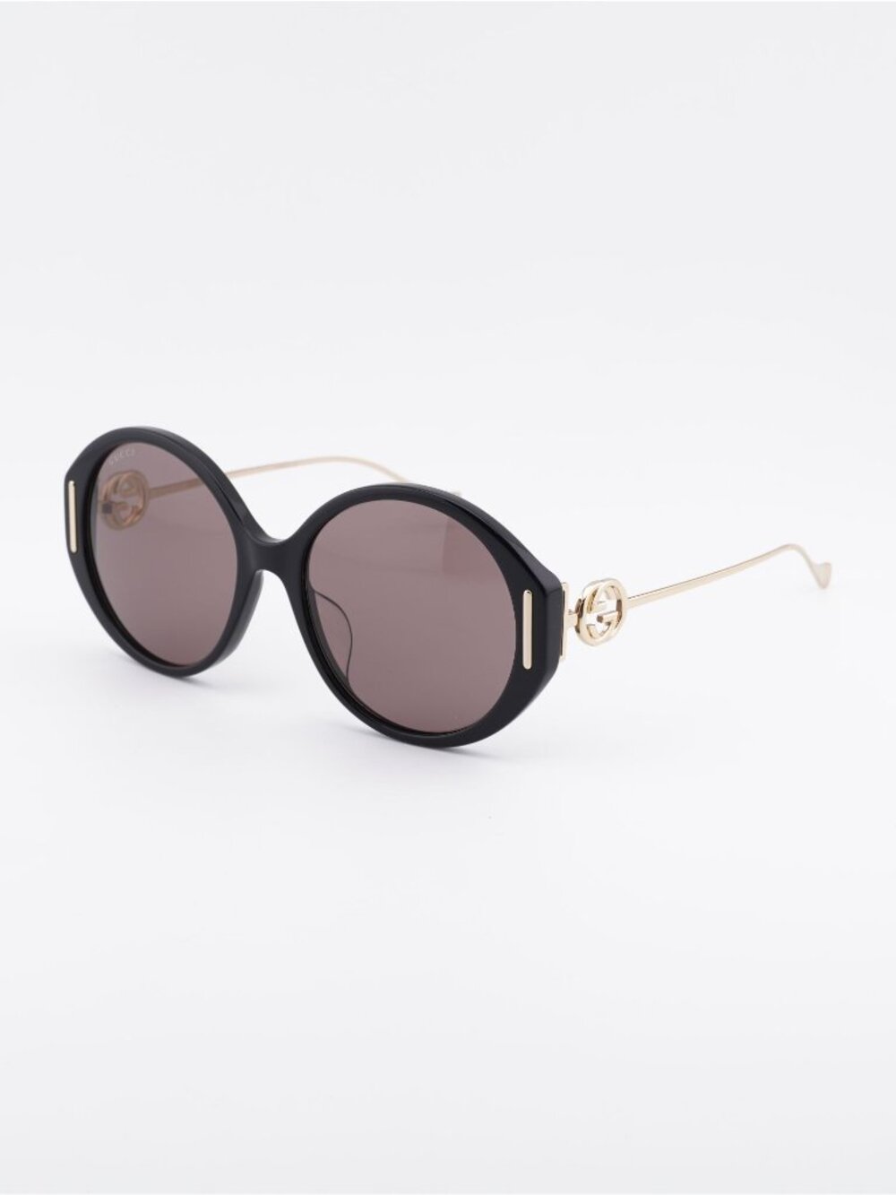 Gucci GG1202SK 001 Sunglasses Black Round Frame, Brown Lenses